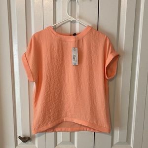 NWT Worthington Salmon colored blouse. New condition from a non smokers home XS